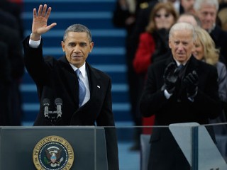 PHOTO:  President Barack Obama waves after his speech while Vice President Joe Biden applauds at the ceremonial swearing-in at the U.S. Capitol during the 57th Presidential Inauguration in Washington