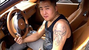 ht gangster china 2 dm 120321 wn Viral Pics Show Chinese Gangsta Fondling Porsches, Puppies and Purse