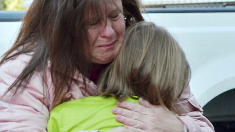 (Image credit: Melanie Stengel/The New Haven Register/AP Photo) - ap_school_shooting_embrace_tk_121214_wblog