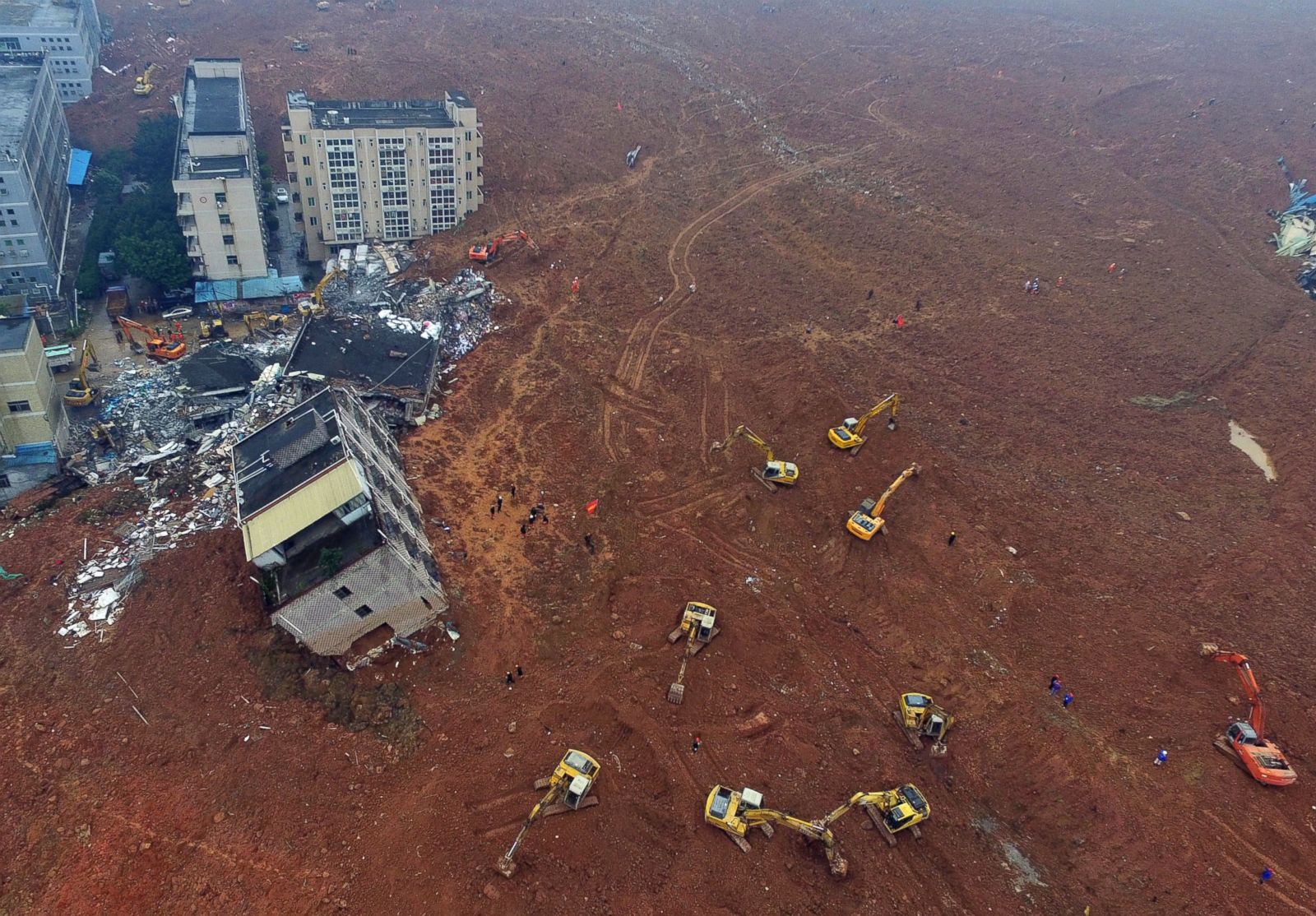Dozens Missing as a Landslide Topples Buildings in South China Photos