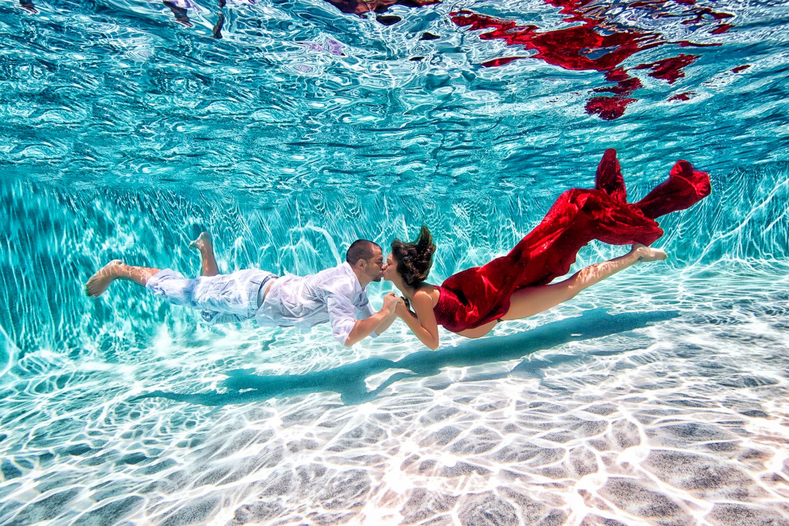 These Underwater Maternity Photos Turn Moms To Be Into Mermaids