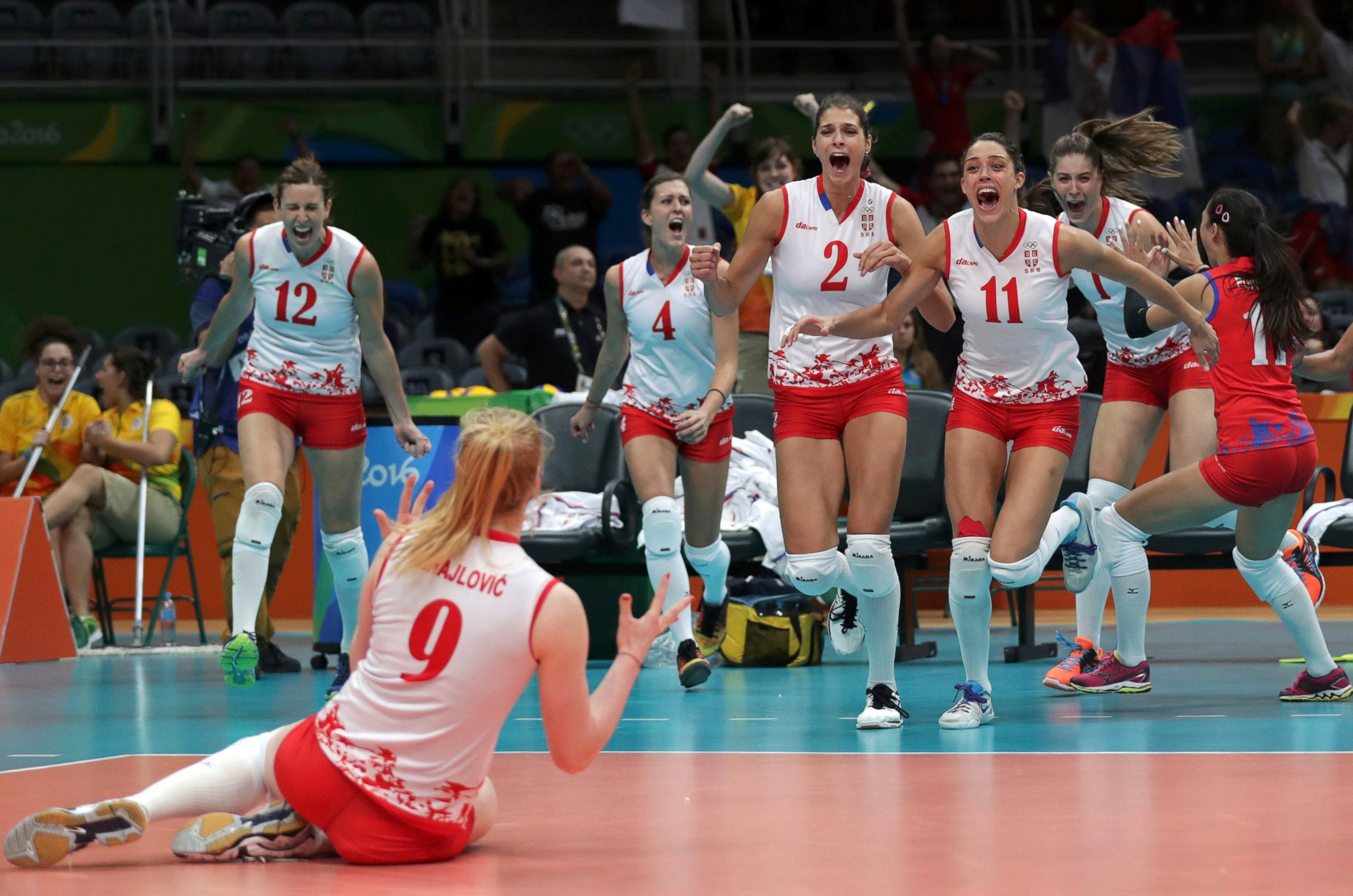 Serbian team players celebrate their defeat of the US team in women's ...