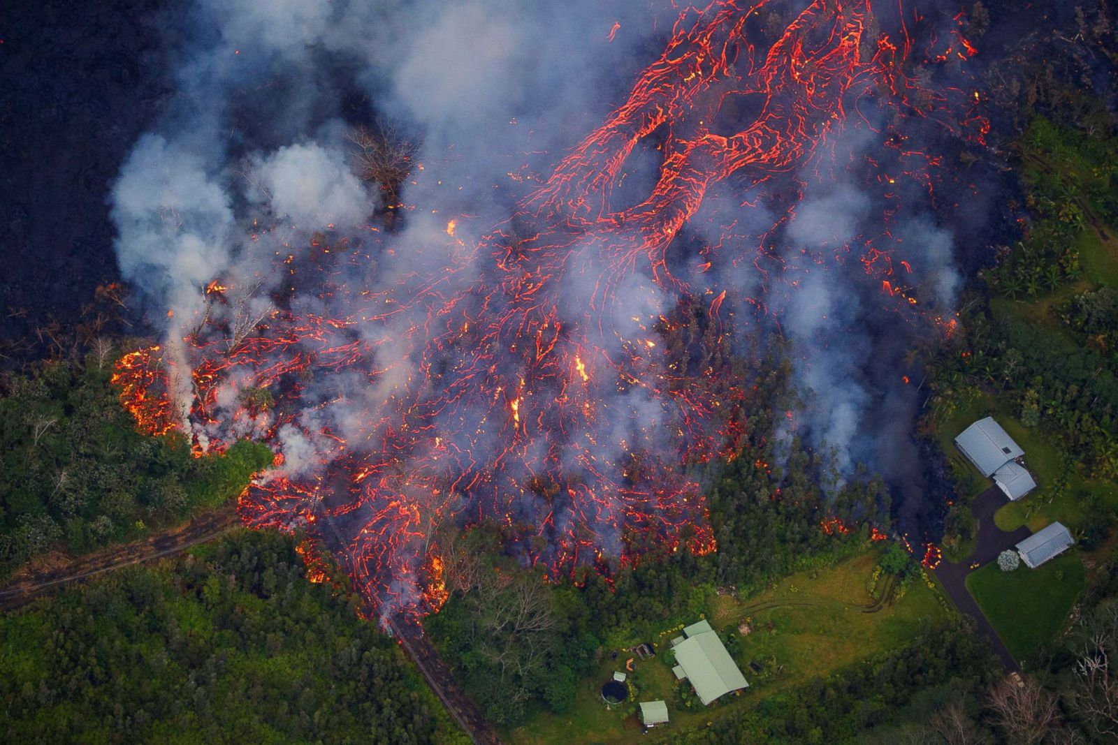 New eruptions from Hawaii volcano create more lava destruction Photos