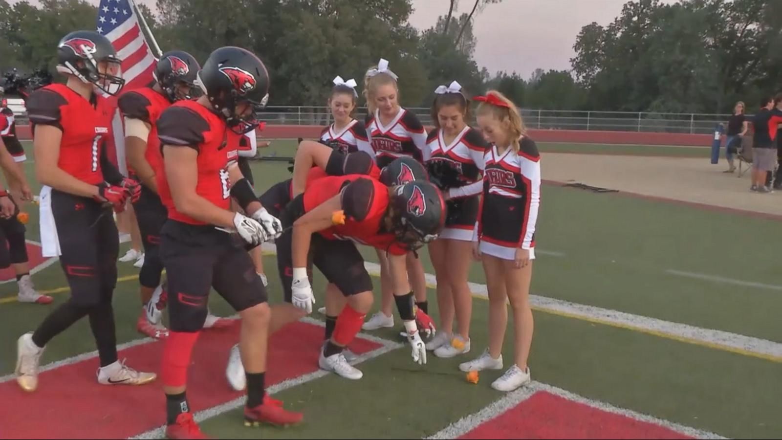High School Football Team Takes to the Field for Cheerleader With Leukemia
